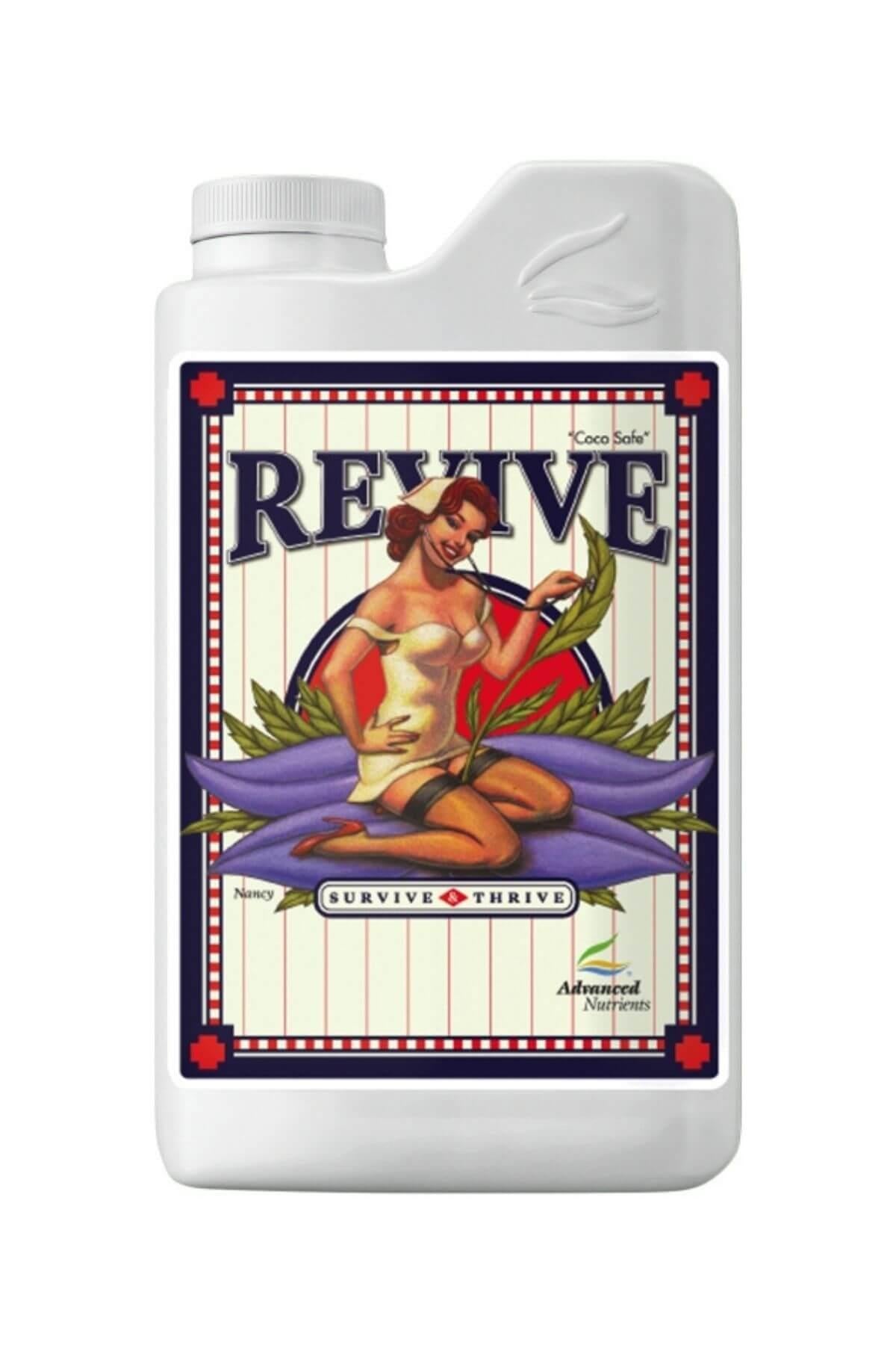 Revive 1 litre beyaz şişe – krem etiket, kırmızı mavi çerçeve, mor yaprak üzerinde figürlü çizim