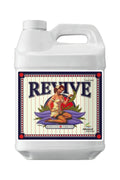 Revive 250 ml beyaz plastik bidon – krem rengi etiket, kırmızı mavi çerçeve, mor yapraklı figür çizimi