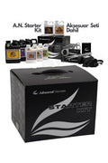 Advanced Nutrients Starter Kit – siyah kutu ve yanında besin şişeleri, büyüteç, ölçü kabı ve pipetler