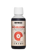Bio Bloom 250 ml koyu renkli şişe – bej kraft etiket, turuncu kırmızı daire simgesi, beyaz kapak