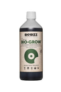 Bio Grow 1 litre koyu renkli şişe – bej kraft etiket, yeşil yaprak diski, World Wide Organics yazısı