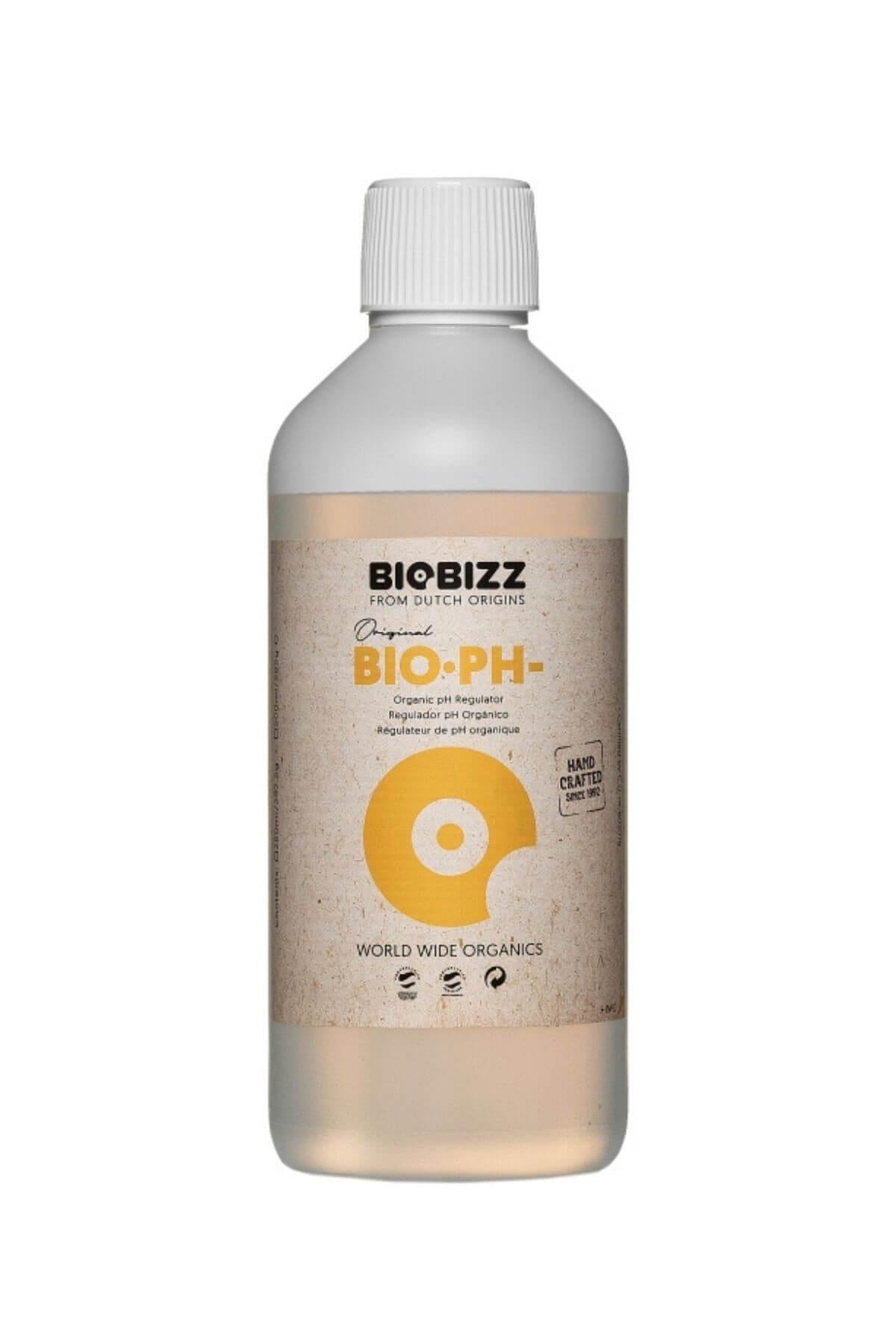 Bio pH Down 500 ml şeffaf şişe – bej etiket, sarı daire simgesi, World Wide Organics yazılı alt bant