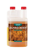 CALMAG Agent 1 litre şeffaf şişe – kehribar renkli sıvı, turuncu etiket, kök görseli, kırmızı kapaklar