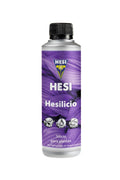 Hesi Hesilicio 250 ml gümüş şişe – mor etiket, Hesi amblemi ve siyah vidalı kapak, silis simgeleri